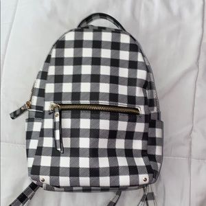 Black and white checkered board backpack